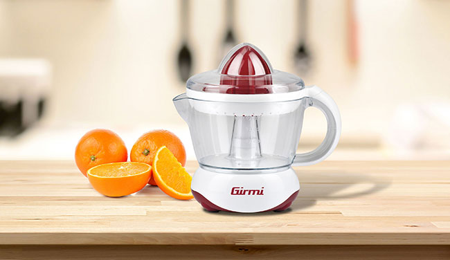Automatic press-to-operate citrus juicer